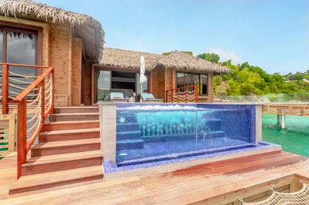 antigua huts on the water